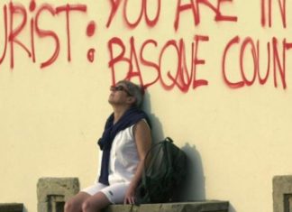 A “tasty bite of Basque reality” for South African readers A woman takes in the sunshine in San Sebastian, in the Spanish Basque region.