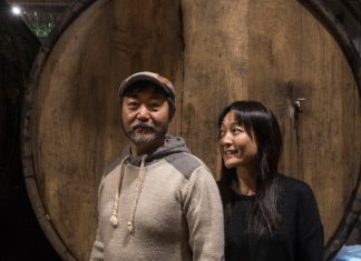 Korean-Americans open a Basque cider house in Brooklyn The siblings Peter and Susan Yi in front of one of the casks at their new Brooklyn Cider House in Bushwick. Credit Victor J. Blue for The New York Times
