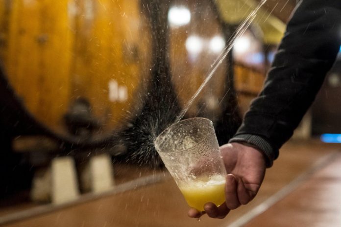 At Petritegi, as at other cider houses, how you fill your glass is an essential skill.CreditDaniel Rodrigues for The New York Times