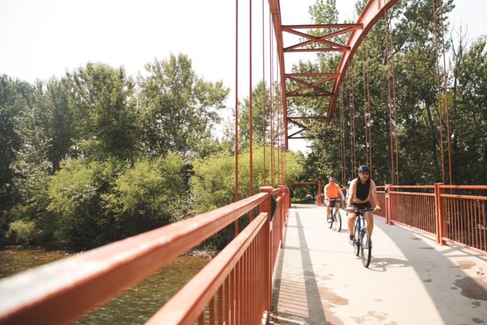 Bikers enjoy the Boise River Greenbelt.CreditTamara Kenyon for The New York Times