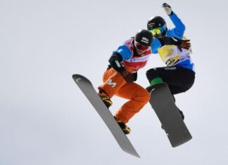 Lucas Eguibar gipuzkoarra munduko Snowboard cross txapelduna Luca Eguibar (in den orangefarbenen Hosen) ist der neue Weltmeister. © APA/afp / JAVIER SORIANO